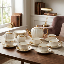 White Porcelain Tea Set with Gold Trim - 17 Piece