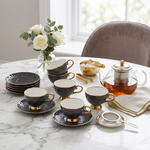 Black Embossed Cup and Saucer Set with Gold Trim