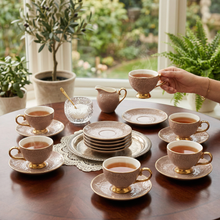 Brown Embossed Cup and Saucer Set with Gold Trim