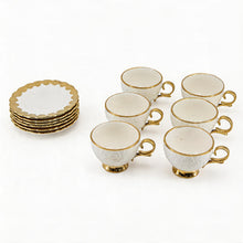 White Embossed Cup and Saucer Set with Gold Trim