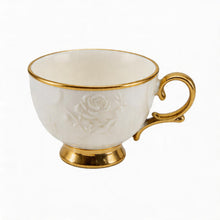 White Embossed Cup and Saucer Set with Gold Trim