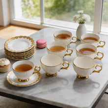 White Embossed Cup and Saucer Set with Gold Trim