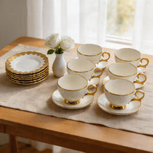 White Embossed Cup and Saucer Set with Gold Trim