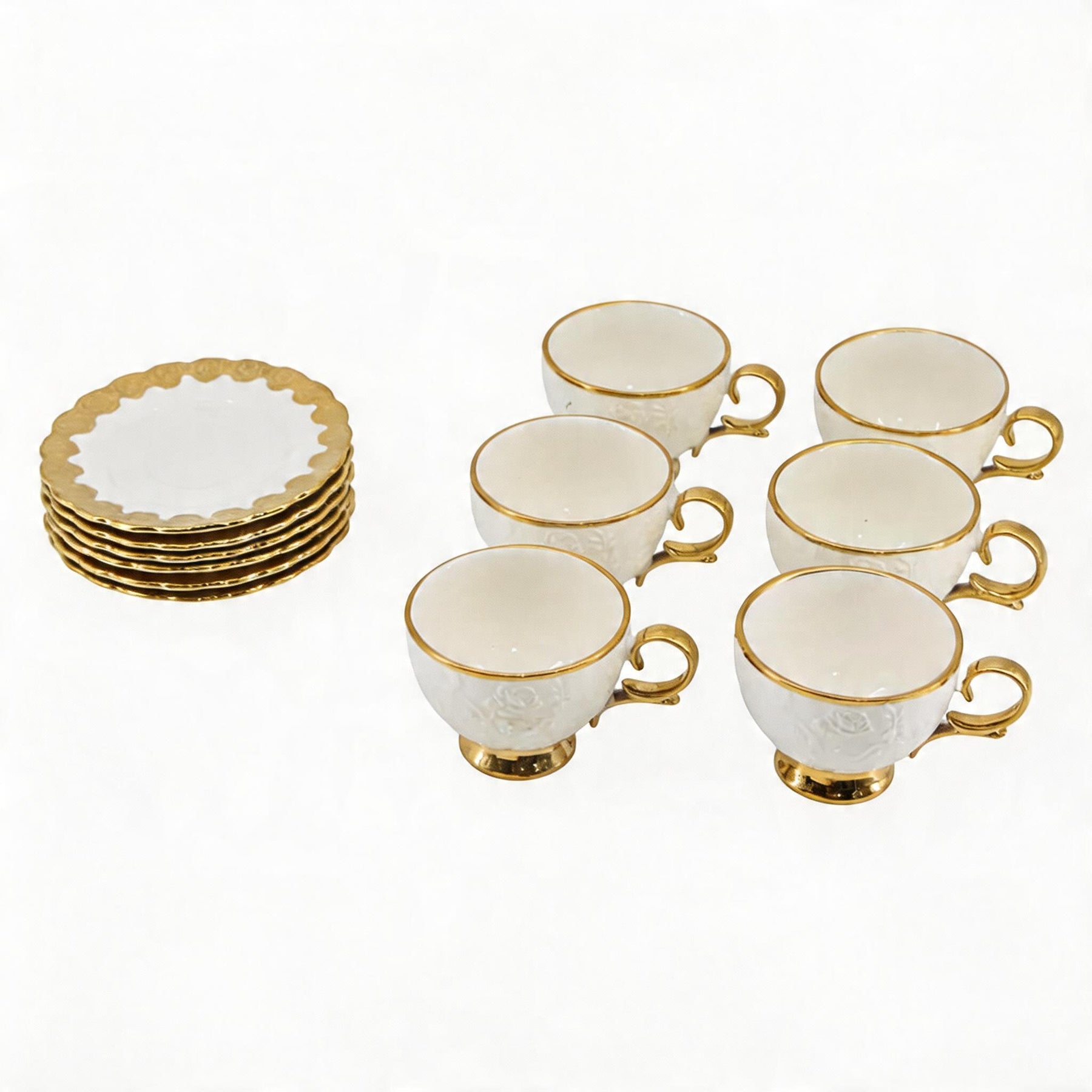 White Embossed Cup and Saucer Set with Gold Trim