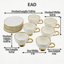 Decorative White Tea Cups and Matching Saucers