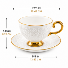 Decorative White Tea Cups and Matching Saucers