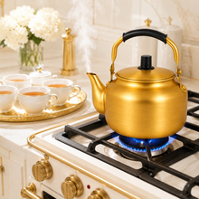 1.5L Golden Tea Kettle with Black Grip Handle and Lid