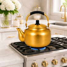 2L Gold-Tone Tea Kettle with Black Grip Handle and Lid