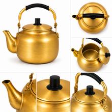 2L Gold-Tone Tea Kettle with Black Grip Handle and Lid