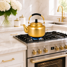 3L Golden Tea Kettle with Black Grip Handle and Fitted Lid