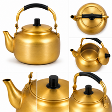 3L Golden Tea Kettle with Black Grip Handle and Fitted Lid