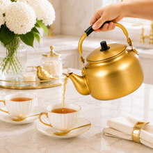 8L Golden Tea Kettle with Black Grip Handle and Fitted Lid