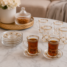 12-Piece Gold-Rimmed Glass Turkish Tea Cup and Saucer Set with Black Geometric Accents