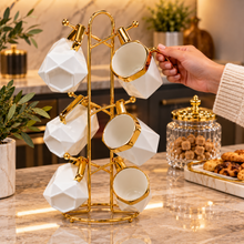 6-Piece White Geometric Ceramic Mug Set with Gold-Tone Rims & Hanging Display Stand